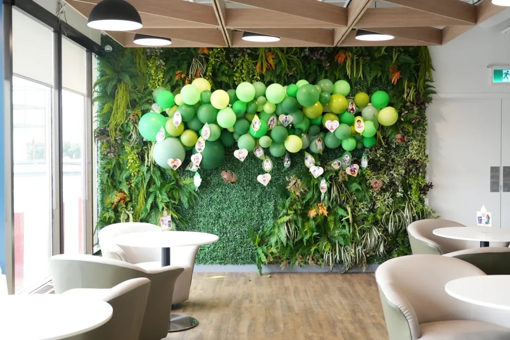 Decorated green wall at S3PACE